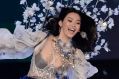 Ming Xi loses her balance on the catwalk for the Victoria's Secret Fashion Show.