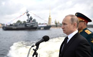 Vladimir Putin addresses the military parade during the Navy Day celebration in St.Petersburg, Russia