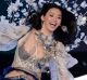 Ming Xi loses her balance on the catwalk for the Victoria's Secret Fashion Show.