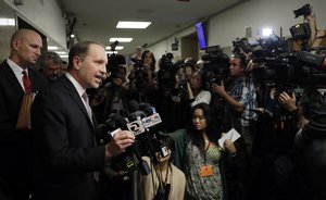 San Francisco public defender attorney, Francisco Ugarte, second from left, answers questions after a verdict was reached in the trial of Jose Ines Garcia Zarate Thursday, Nov. 30, 2017, in San Francisco.