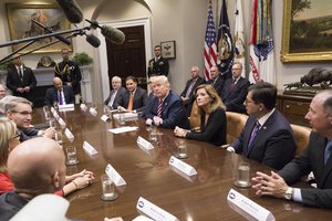 File - President Donald J. Trump hosts a tax reform industry and business leaders meeting, October 31, 2017.