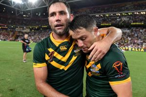 Australian captain Cameron Smith (left) and Cooper Cronk celebrate their win. 