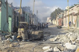 SOMALIA: The wreckage of a vehicle lies amongst the rubble at the site of a VBIED (truck bomb) attack undertaken by the militant group al Shabaab in the Somali capital of Mogadishu on October 15, 2017