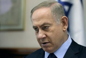 Israeli Prime Minister Benjamin Netanyahu chairs a weekly cabinet meeting, in Jerusalem, Sunday, Jan. 1, 2017.