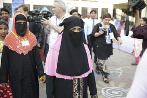 A group of Rohingya refugees arrive at the Archbishop's residence during a visit by Pope Francis in Dhaka, Bangladesh, Friday, Nov. 1, 2017.