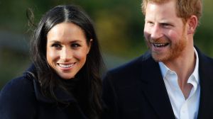 Britain's Prince Harry and his fiancee Meghan Markle arrive at Nottingham Academy in Nottingham, England , Friday, Dec. ...