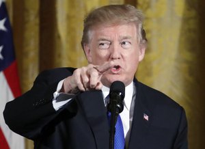 President Donald Trump speaks during a Hanukkah reception in the East Room of the White House, Thursday, Dec. 7, 2017, in Washington.