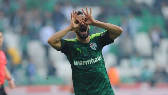 Aziz Behich celebrates a goal.