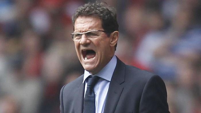 26/03/2011 WIRE: (FILES) This file photo taken on March 26, 2011 shows England's Italian Manager Fabio Capello shouting during his team's match against Wales during a Euro 2012, Group G qualifying football match at the Millenium Stadium, Cardiff, Wales. Capello has quit as England manager following the Football Association's decision to strip John Terry of the captaincy, the FA announced on February 8, 2012. AFP PHOTO/IAN KINGTON