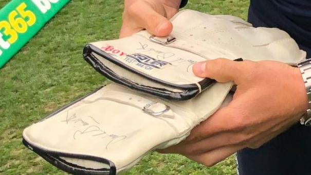 Jonny Bairstow with the gloves of his late father.