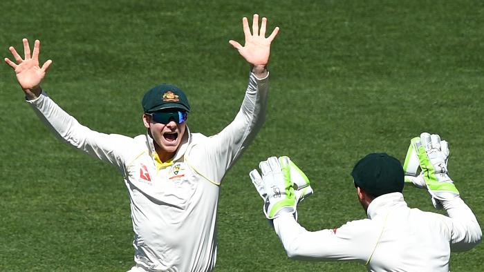 Australian captain Steve Smith (left) celebrates Australia's match win against England on Day 5 of the Second Test match between Australia and England at the Adelaide Oval in Adelaide, Wednesday, December 6, 2017. (AAP Image/Dave Hunt) NO ARCHIVING, EDITORIAL USE ONLY, IMAGES TO BE USED FOR NEWS REPORTING PURPOSES ONLY, NO COMMERCIAL USE WHATSOEVER, NO USE IN BOOKS WITHOUT PRIOR WRITTEN CONSENT FROM AAP