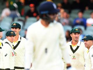 Australian cricketers look on as England batsman James Vince departs, dismissed for 15 runs on Day 4 of the Second Test match between Australia and England at the Adelaide Oval in Adelaide, Tuesday, December 5, 2017. (AAP Image/Dave Hunt) NO ARCHIVING, EDITORIAL USE ONLY, IMAGES TO BE USED FOR NEWS REPORTING PURPOSES ONLY, NO COMMERCIAL USE WHATSOEVER, NO USE IN BOOKS WITHOUT PRIOR WRITTEN CONSENT FROM AAP