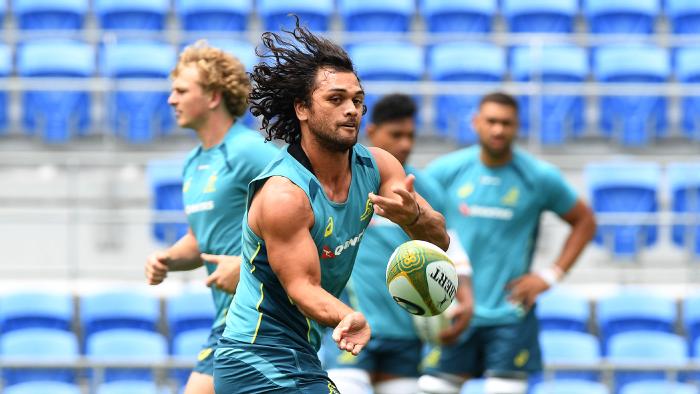 Wallabies player Karmichael Hunt passes the ball during a team training session at Cbus Super Stadium on the Gold Coast, Thursday, October 19, 2017. The Wallabies play the New Zealand All Blacks in a Bledisloe Cup match in Brisbane on Saturday. (AAP Image/Dave Hunt) NO ARCHIVING