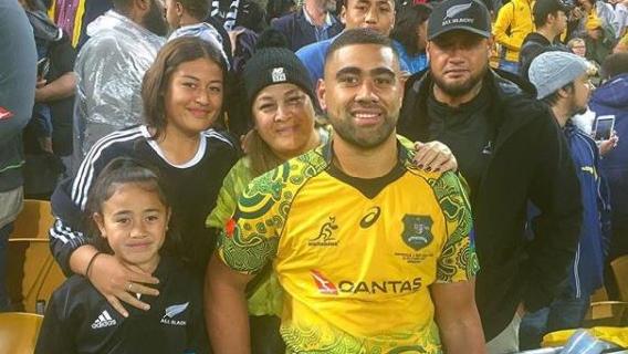 Lukhan Tui poses with his family after the Wallabies' win over the All Blacks in Bledisloe III.