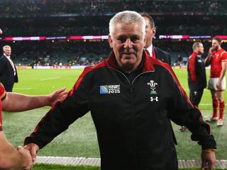 LONDON, ENGLAND - SEPTEMBER 26: Wales Cooach Warren Gatland shakes hands with Tomas Francis as he walks off the field of play following victory in the 2015 Rugby World Cup Pool A match between England and Wales at Twickenham Stadium on September 26, 2015 in London, United Kingdom. (Photo by David Rogers/Getty Images)