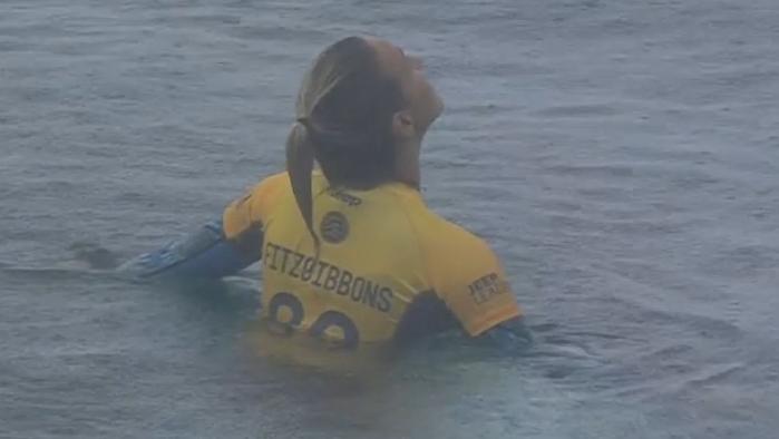 Sally Fitzgibbons looks to the sky as rain falls on her title dreams.