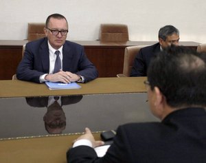 U.N. Undersecretary-General for Political Affairs Jeffrey Feltman, left, talks with North Korean Vice Foreign Minister Pak Myong Guk at the People's Palace of Culture in Pyongyang, North Korea Wednesday, Dec. 6, 2017