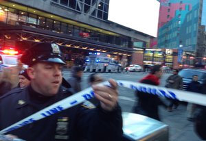 Police respond to a report of an explosion near Times Square on Monday, Dec. 11, 2017, in New York.