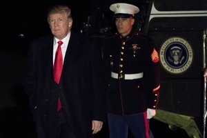 President Donald Trump walks across the South Lawn of the White House in Washington, Sunday, Dec. 10, 2017. Trump is returning from a trip to his Mar-a-Lago estate in Palm Beach, Fla.