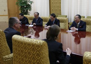 U.N. undersecretary-general for political affairs Jeffrey Feltman, left, meets with North Korean Foreign Minister Ri Yong Ho, right, at the Mansudae Assembly Hall in Pyongyang, North Korea Thursday, Dec. 7, 2017.