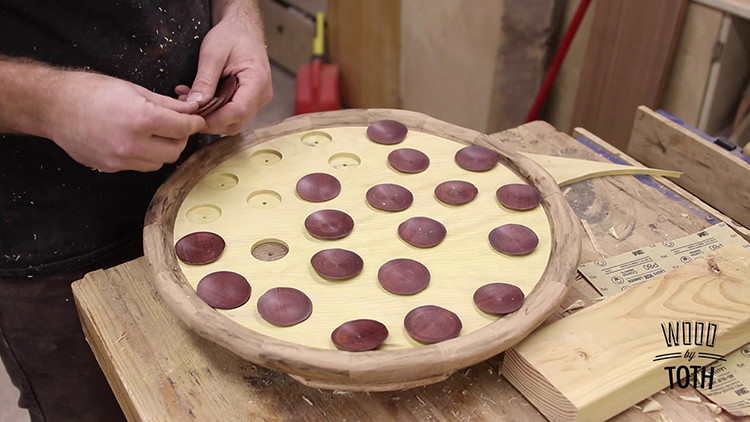 Woodworker Makes a Tasty Looking Pepperoni Pizza Out of Various Types of Wood