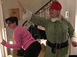 Sue Perkins (left) was pictured twerking next to television star Emma Kennedy (right) during a festive party 