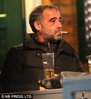 Holy smokes! Beaming broadly on the outing, Michael - who plays mechanic Kevin Webster on Coronation Street - also enjoyed a cigarette as he sat outside the bar