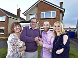 John and Kelly Davie (right) outside their new £189,000 home, previously owned by David and Margaret West (left), at Leven Place in Kinross, Scotland