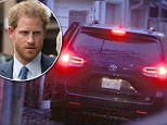 Breaking cover: Covering his head with a hood, Prince Harry dashed out of girlfriend Meghan Markle's Toronto apartment and bundled into a waiting car, pictured, yesterday afternoon. The couple spent two nights holed up together after Harry made a detour to visit her at home