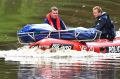 Police retrieve a body from the Yarra on Tuesday afternoon.