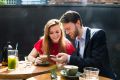 Happy app users: Housemates Kaitlyn Tremblay and Nicholas Phillpott having coffee in Barangaroo. 