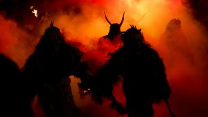 Krampus figures terrorize the streets during a December 5 parade.