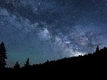 This June 18, 2017, photo provided by Nils Ribi Photography shows the Milky Way over the Smoky Mountains in central Idaho. A giant chunk of central Idaho with a dazzling night sky has become the nation's first International Dark Sky Reserve. (Nils Ribi Photography via AP)