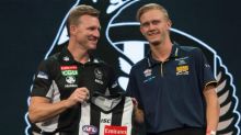 Jaidyn Stephenson is welcomed by Pies coach Nathan Buckley.