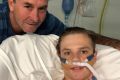 Canberra Raiders' coach Ricky Stuart visits 13-year-old accident victim Thomas "TJ" Campagna at Canberra Hospital on ...