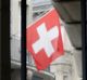 Credit Suisse will take a writedown of 2.3 billion Swiss francs ($3 billion).