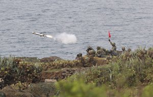 A FGM-148 Javelin missile is launched during Han Kuang military exercises in Penghu county, Taiwan, April. 17, 2013. (AP Photo/Chiang Ying-ying)