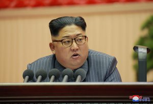 In this Dec. 23, 2017, photo distributed on Dec. 24, 2017, by the North Korean government, North Korean leader Kim Jong Un addresses the conference of cell chairpersons of the ruling party in Pyongyang.