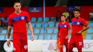 Benfica bound: Australian striker Anthony Carter (left) is set to jump from Portugal's third tier to the country's ...