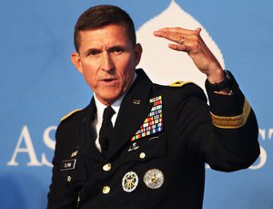 File - Army Lt. Gen. Michael Flynn, director of the Defense Intelligence Agency, discusses global threats during the Aspen Security Forum in Aspen, Colorado, July 26, 2014.