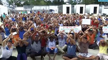 A screencap from an ABC News story, showing Manus Island detainees this week.