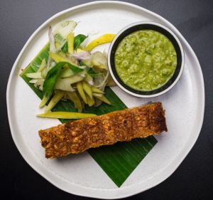 Rotisserie pork belly with fennel pickle and scud chilli death sauce served at Chin Chin in Sydney.