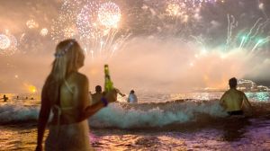 Fireworks light the sky over Copacabana beach during New Year's Eve celebrations in Rio de Janeiro, Brazil, Thursday, ...