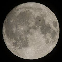 The International Space Station, with a crew of six onboard, is seen in silhouette as it transits the Moon at roughly five miles per second, Saturday, Dec. 2, 2017, in Manchester Township, York County, Pennsylvania. Onboard are: NASA astronauts Joe Acaba, Mark Vande Hei, and Randy Bresnik; Russian cosmonauts Alexander Misurkin and Sergey Ryanzansky; and ESA astronaut Paolo Nespoli.  Photo Credit: (NASA/Joel Kowsky)