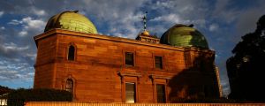 Observatory Hill, with its two telescope domes and its clock ball tower in the centre.