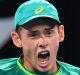 Rallying cry: Alex de Minaur evokes a young Lleyton Hewitt after winning the first set against Steve Johnson of the USA.