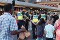 More than 1000 people were searched by police during New Year's Eve celebrations in Melbourne.