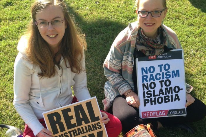 Activists call for support for Muslims and Indigenous Australians at rally in Brisbane's CBD