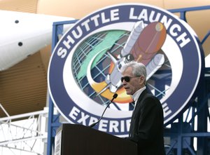 Former astronaut John Young introduces some of the astronauts that were on hand for the grand opening of the Space Shuttle Experience launch simulator at the Kennedy Space Center Visitor Complex in Cape Canaveral, Fla., Friday, May 25, 2007.