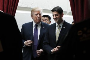 President Donald Trump, left, walks with House Speaker Paul Ryan of Wis., Thursday, Nov. 16, 2017, as they leave a meeting with House Republicans on Capitol Hill in Washington.